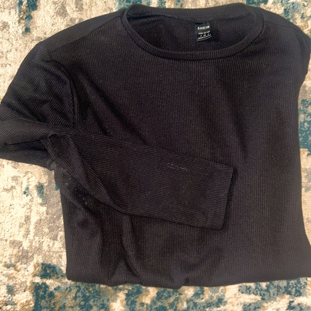 Black long sleeve staple top